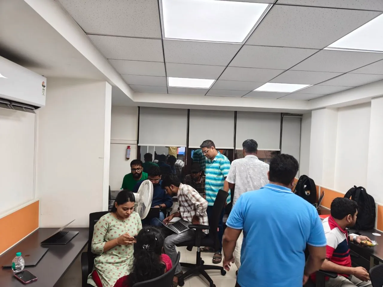 Attendees working together at a Bangalore meetup